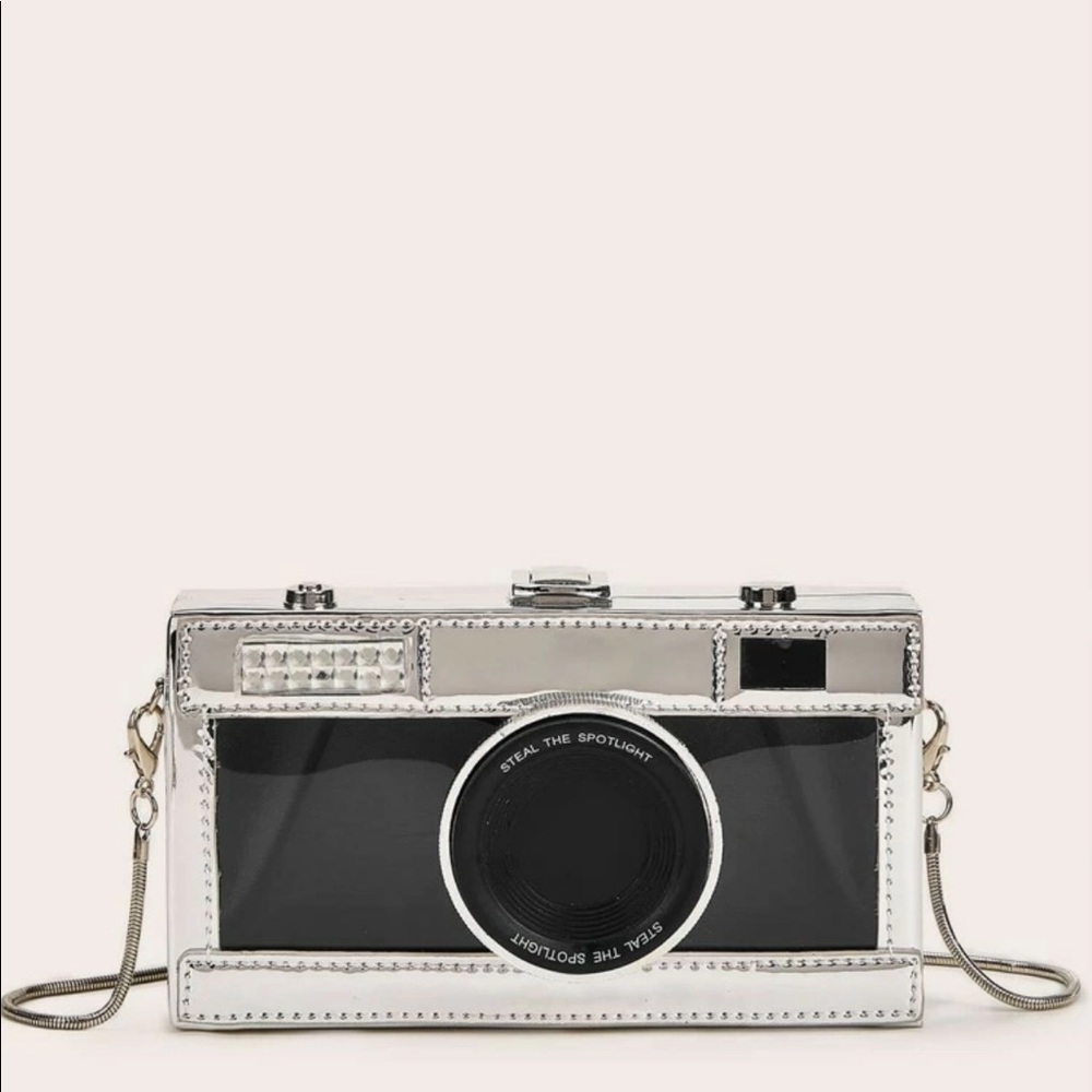 She in camera designs chain crossbody bag